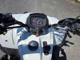 a motorcycle that is parked on the side of the road