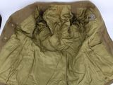 a jacket that is laying on top of a table