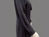 an image of a mannequin dressed in a black suit and tie