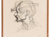 un dessin représentant la tête d'un homme moustachu, dans un cadre en bois