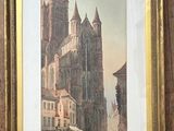 framed picture of a painting of a city street with a church in the background