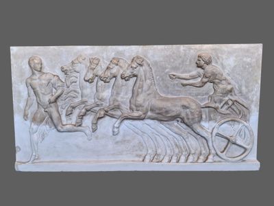 a sculpture of a man riding a horse and a man riding a horse