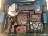 a box with tools in it on a table
