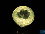 an image of a yellow diamond on a black surface