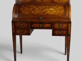 an antique writing desk with drawers and drawers on top of it