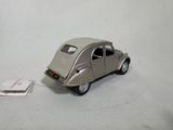 a toy car that is sitting on a white surface