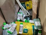 a cardboard box filled with assorted items in it