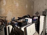 an image of a messy room with a lot of clutter on the floor