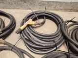 a lot of hoses that are laying on the floor