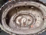 a dirty bowl sitting on top of a table