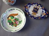 a plate with a picture of a woman on it and a bowl with a picture of a man on it