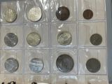 a lot of coins that are in a display case