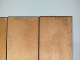 two pieces of wood stacked on top of each other