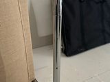 a bag sitting on the floor next to a chair