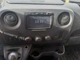 a dashboard of a truck with a clock on it