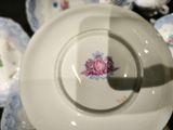 a close up of a plate with a flower design on it