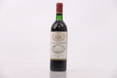 a bottle of wine that is sitting on a table