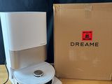 a box with a record and a pair of discs on it
