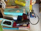 a pile of toy trains sitting on top of a table