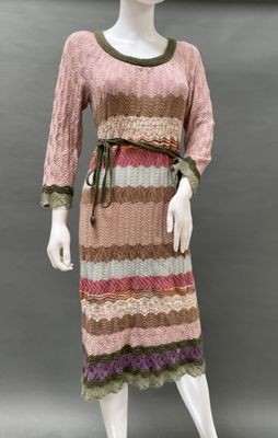 an image of a mannequin wearing a pink and brown dress