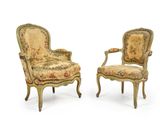pair of louis xv style armchairs with floral upholstered upholstered arms