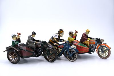 five figurines of people riding on a motorcycle and a car