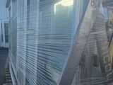 a picture of a truck that has some plastic wrap on it