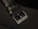 a close up of a watch strap on a table