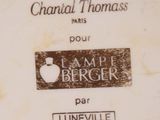 a plate with a label on it that says lampe bergerer