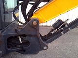 an image of a close up of the front end of a small excavator