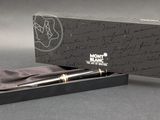 a pen that is sitting in a box on a table