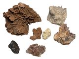 many different types of rocks on a white surface