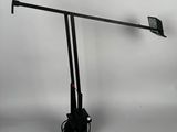 a lamp that is on top of a stand