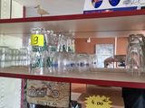 many empty glasses on the shelves in the store