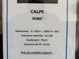 sign in the window of a jewelry store advertising the sale of a new cell phone