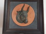 an image of a picture of a bull head in a picture frame
