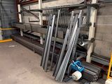 several pieces of metal are stacked up in a warehouse