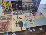 a lot of records on a table in a room