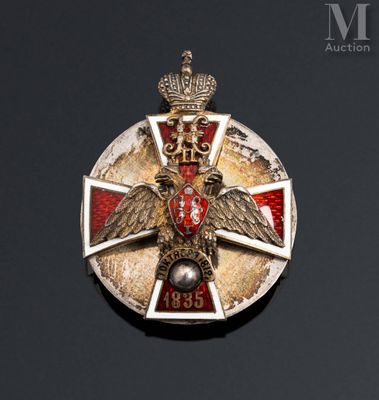 an image of a badge with a crown on it