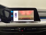 a picture of a car ' s dashboard with a camera on it