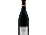 a bottle of wine that is sitting on a table