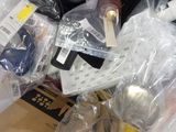 a pile of assorted items sitting on a table