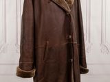 a brown leather coat on a mannequin mannequin mannequin mannequin mannequin mannequin mannequin mannequin manne