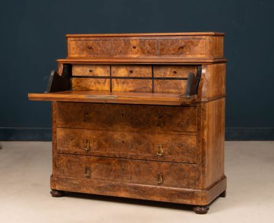 an old wooden desk with drawers and drawers on top of it