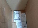 a cardboard box with a picture of a toaster inside of it