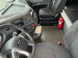 a view of the inside of a bus from the driver ' s seat