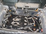 a metal box with a bunch of wires inside of it
