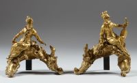 Paire de chenets en bronze doré ciselé à décor d'un couple a…