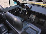 a picture of the interior of a black sports car