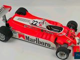 a model of a racing car on a white surface